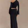 Ainsley Asymmetrical Maxi Skirt With Floral Hardware – Black Ainsley Asymmetrical Maxi Skirt With Floral Hardware – Black
